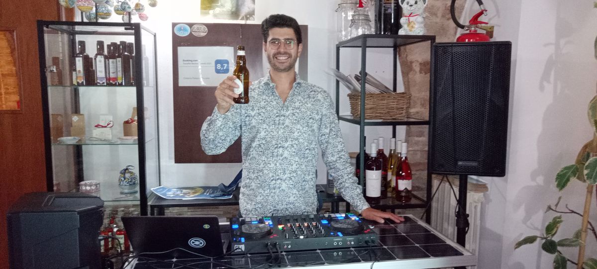 Elliott DJing at a local restaurant in Abruzzo