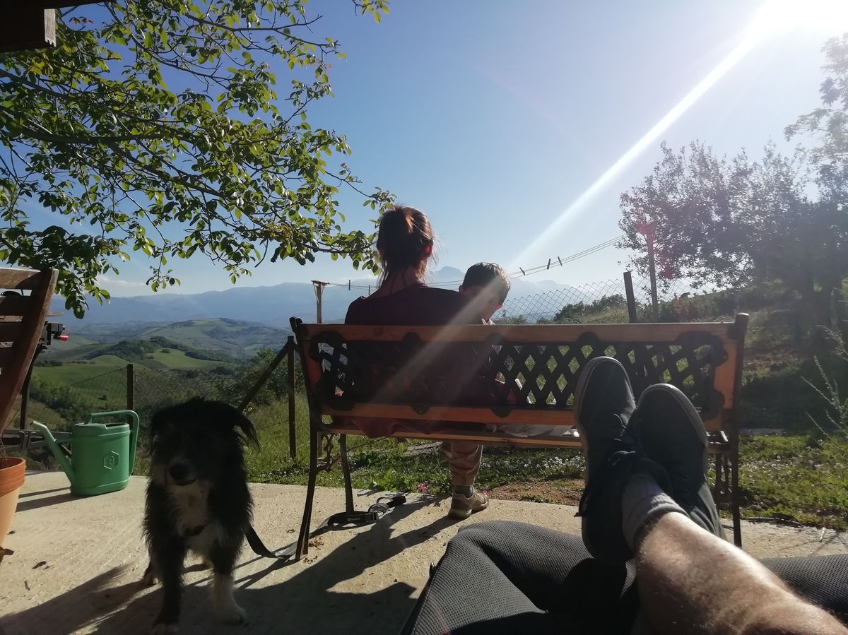 Relaxing in the garden overlooking the Abruzzo hills with the family dog